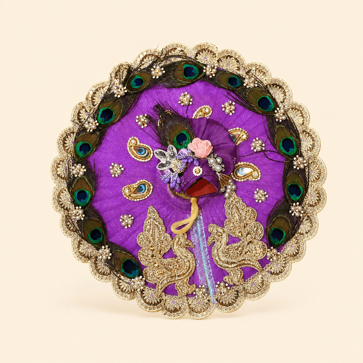 Purple poshak ringed with real peacock feathers and gold zardosi peacocks